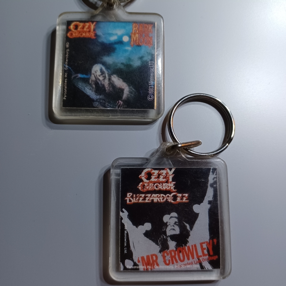 Two vintage keychains from the 1980 both Ozzy Osbourne's